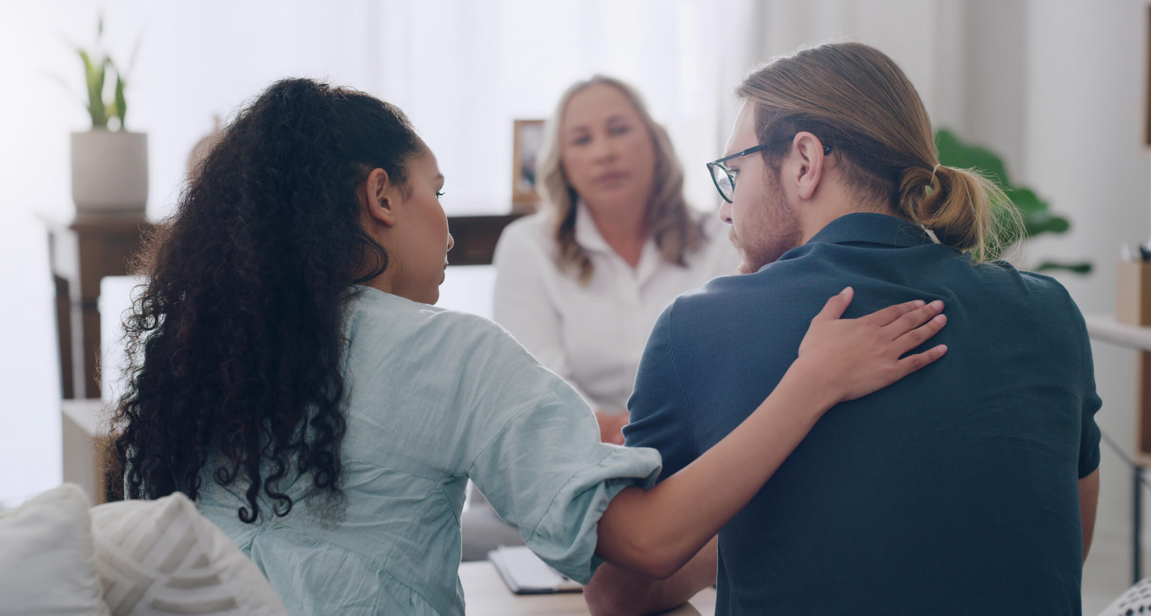 Couple receiving counseling from therapist