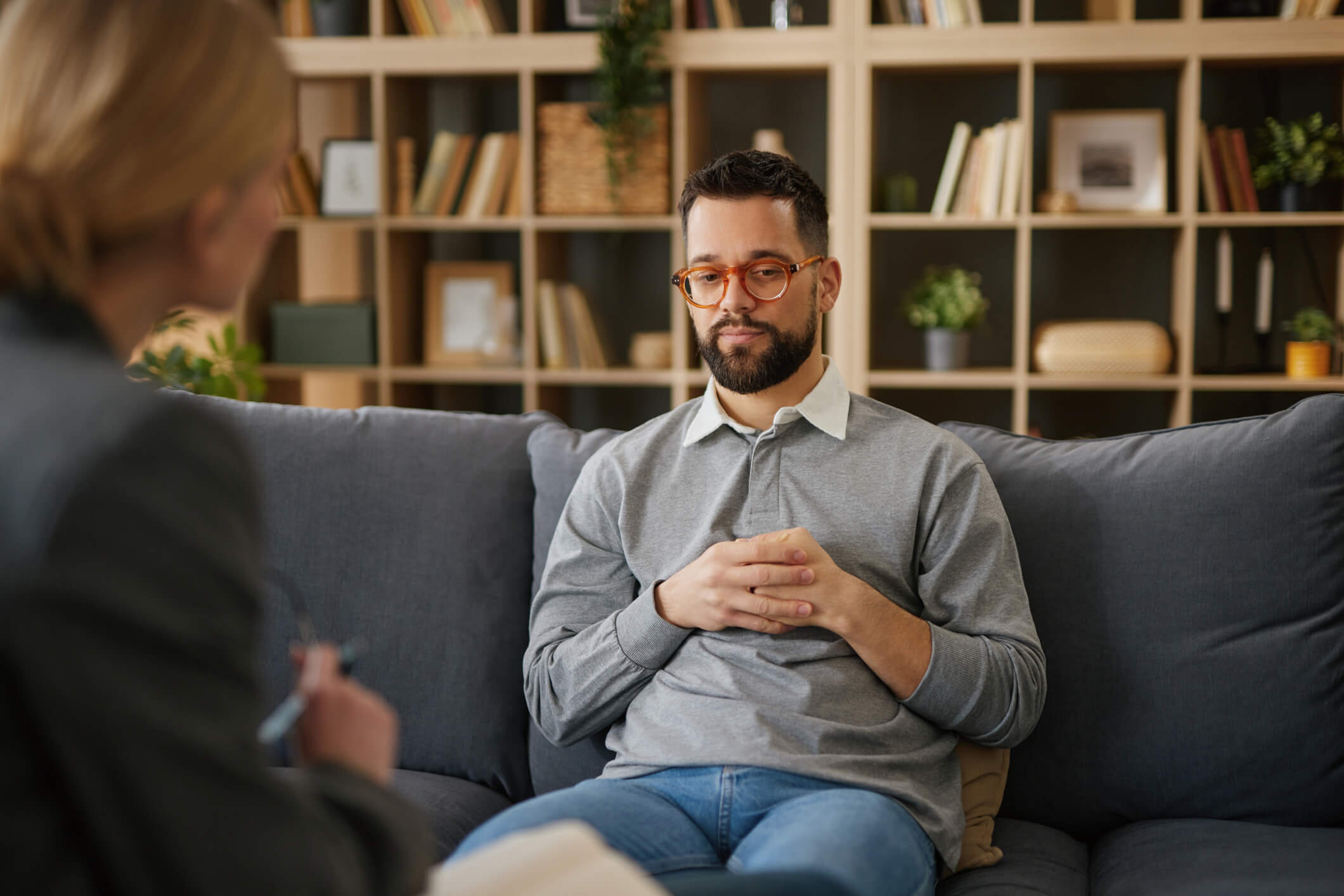 Man in therapy session on couch