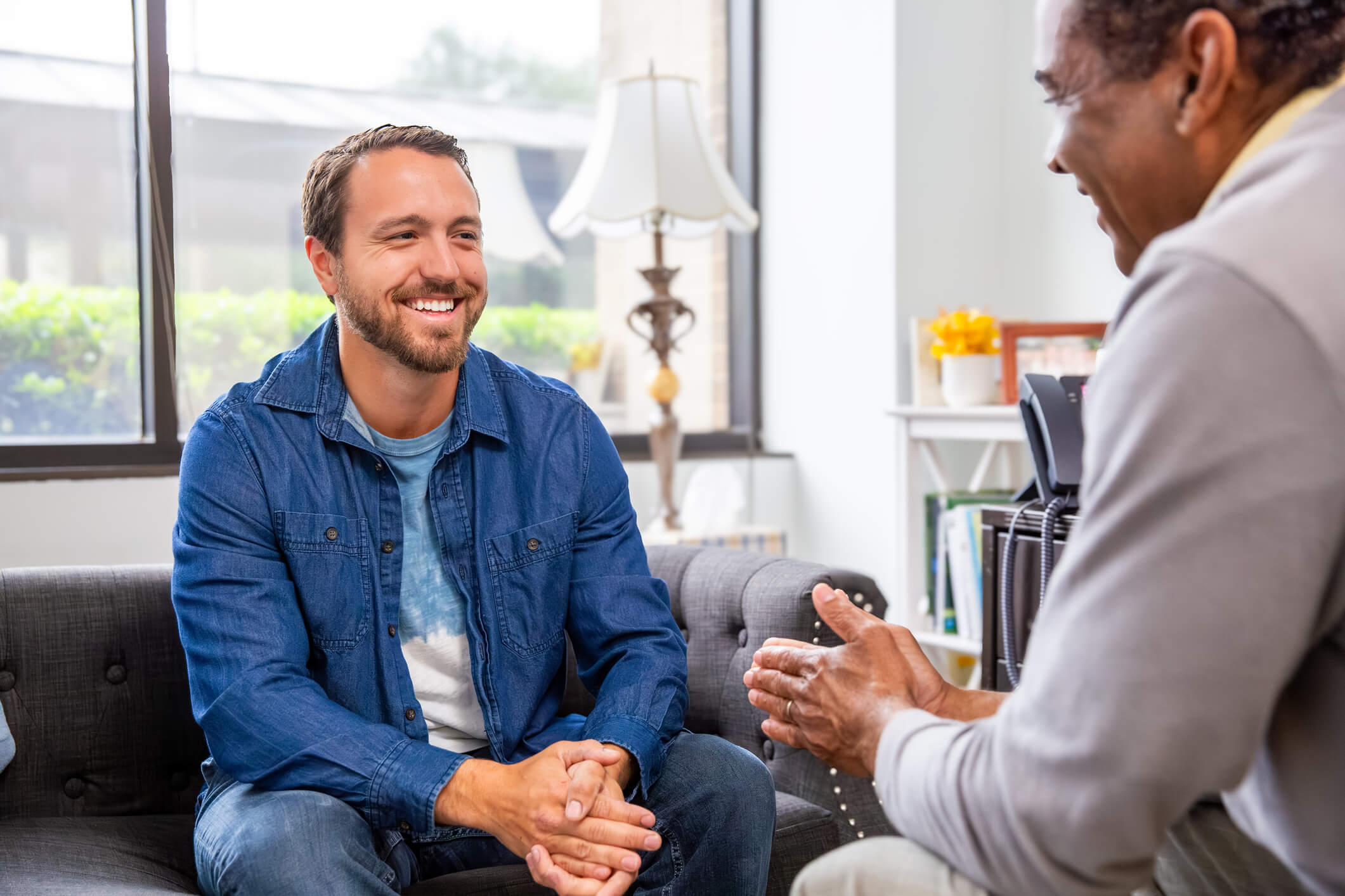 Two men in a counseling session